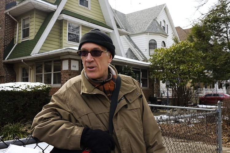 Brooklyn Parrots tour guide and owner Steve Baldwin, shares insight about the monk parakeets in Brooklyn for a small group of bird watchers.