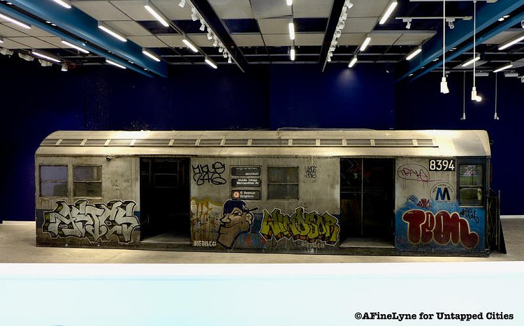 An Abandoned Graffitied NYC Subway Car Is Inside an Empty 42nd Street Storefront