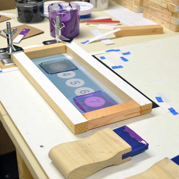 Handprinting signs using subway line blueprints. Sideway Signs - High-quality New York City subway signs officially licensed by the MTA.